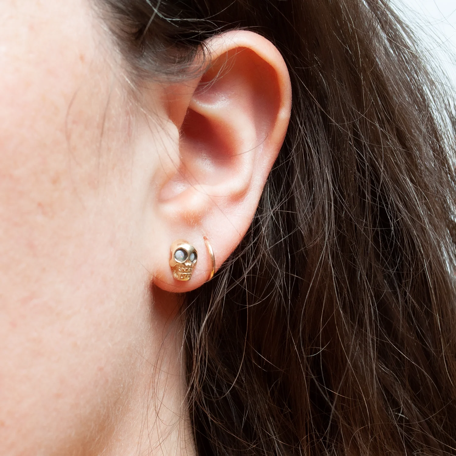 Opal Eyed Gold Skull Studs - Image 2